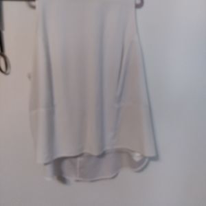 White top with silver zipper and peplum